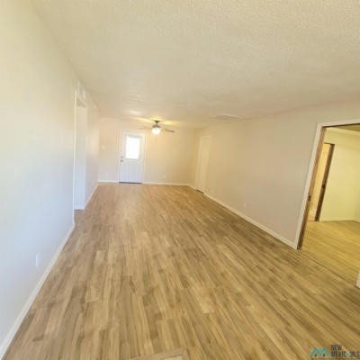 108 E HERVEY ST, ROSWELL, NM 88203, photo 4 of 36